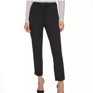 Contemporary styling with convenient side pockets, slim ankle pants. New, no tag
